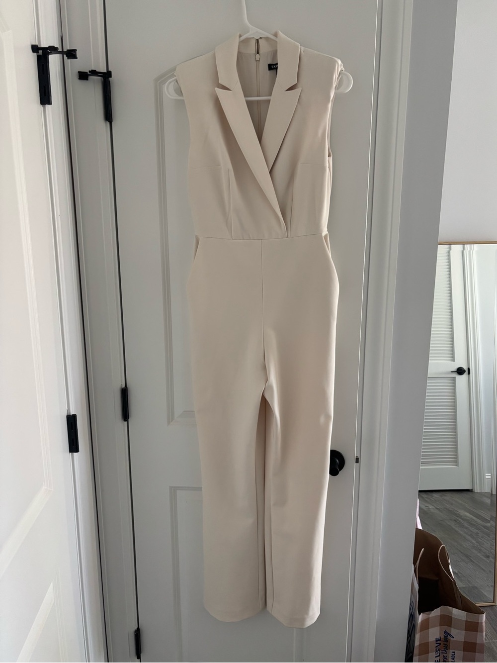 Express Cream Sleeveless Tailored Jumpsuit with Notch Lapel